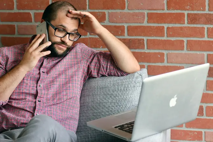 a man with a laptop